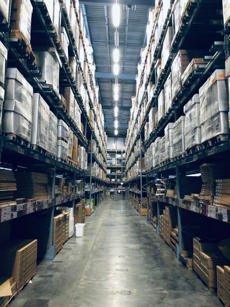 Distribution warehouse with racked inventory